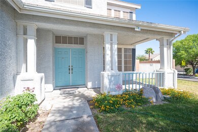 The front entrance is so inviting with a lovely bl