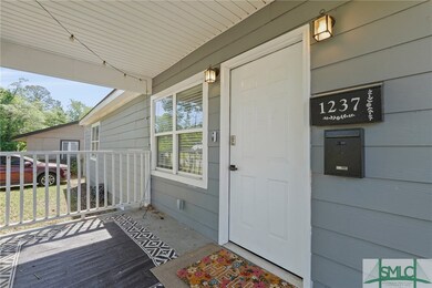 Nice size covered front porch perfect for relaxing