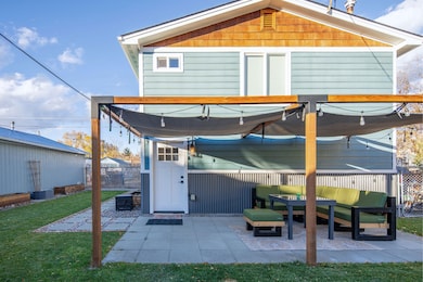 Front of property with a patio and an outdoor hangout area