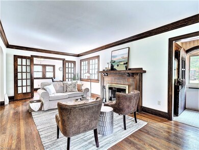 * RESTORED/REFINISHED HARDWOOD FLOORS IN THE LIVIN
