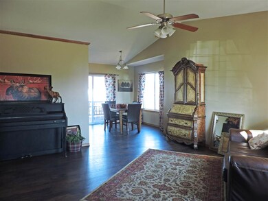 Vaulted ceilings in living room and dining  Wood l