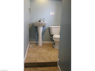 Lower level bath has ceramic & even a shower (unpi