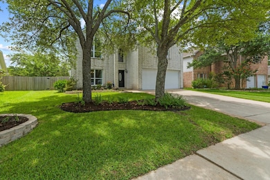 View of front of house featuring concrete drivewa