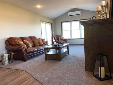 Photo of similar model living room.