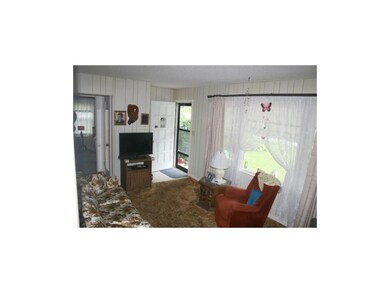 Front living room has picture window.