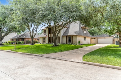 Featuring a newer garage door and spacious entranc