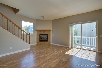 LR W/Gas Fireplace & Deck Access