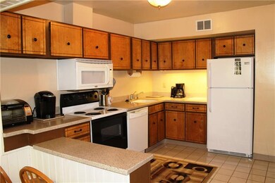 The kitchen is fully equipped for your cooking nee