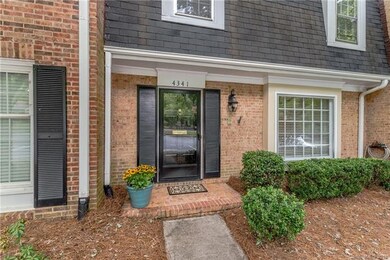 Front entrance; solid wood entry door with Baldwin