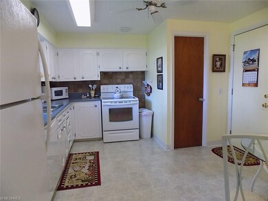 View of half bath and garage door.