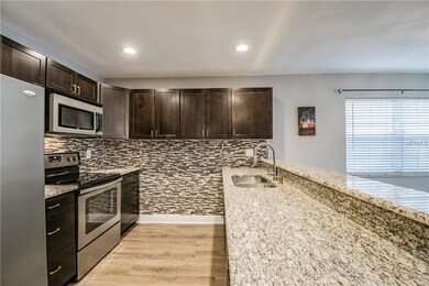 Wood Cabinets, Granite & Designer Wall Tile