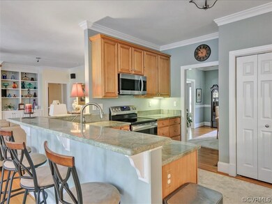 Kitchen with granite counters and stainless applia