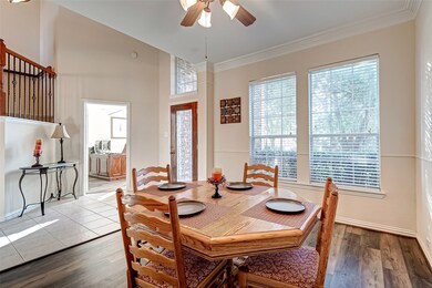 Light and bright dining room anticipates your special celebrations. New flooring has been installed here too! Stunning!