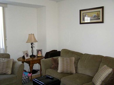 Living Room. Neutral Walls and Carpet Plus the Ope