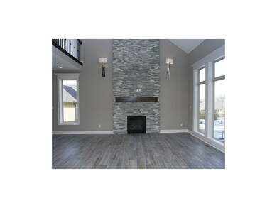 2 story stone fireplace