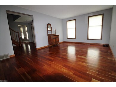 Living Room with beautiful solid cherry hardwood f