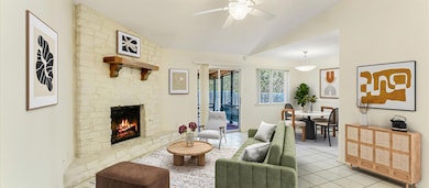 Living area featuring tile patterned flooring, a 