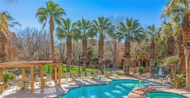 Community pool with a patio area