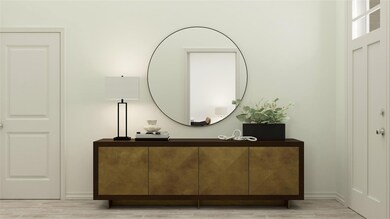 Bathroom featuring wood finished floors and basebo