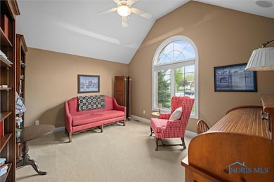 Circle topped window and cathedral ceiling in the