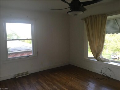 Master bedroom with large bay window