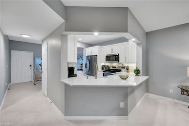 Kitchen with appliances with stainless steel finis