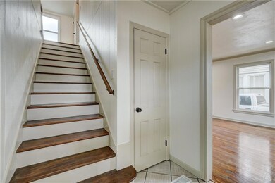 Convenient coat closet and stairway off the entry.