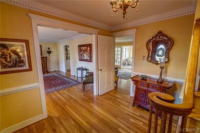 Heavy dentil molding and chair rail in Foyer