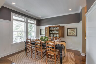 The dining room features wainscoting, as well as plenty of wall space for your furniture.