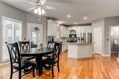 New eat-in Kitchen with half bath and primary entr