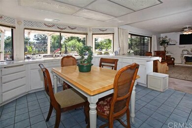 Picturesque windows overlooking backyard and golf 