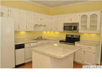 Spacious Kitchen with island has new stainless bui