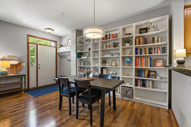 The main entrance into the home with a coat area to the right of the door and immediate access to the dining/eat-in kitchen area.