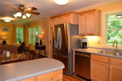 Kitchen has island eating bar for...