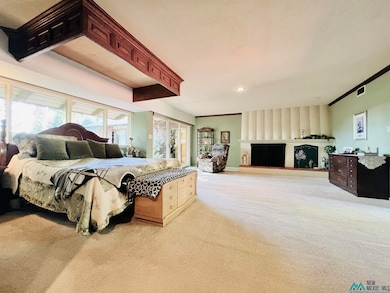 This spacious master suite has sliding doors to private courtyard.