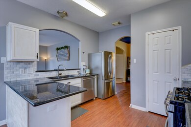 Another view of the kitchen shows the beautiful gr