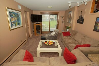 Family room with siding glass door to lovely patio
