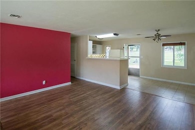 Open concept home... light and bright!!   Wood laminate floors in living room and hallway....looks great.