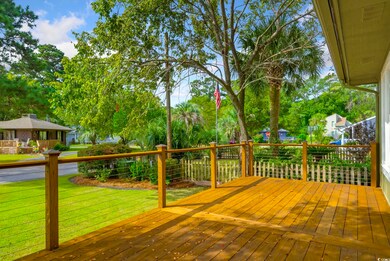Deck featuring a lawn