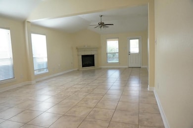 Open floor plan w a view of breakfast room and living room