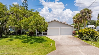 View of front of home featuring concrete driveway,