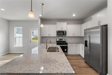 1006 Poets Walk Rd, Whitsett, NC 27377 - photo 4