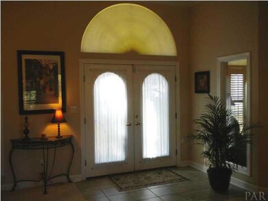Foyer With 11' Ceilings, Circle Top Window, Ceramic Tile Floor