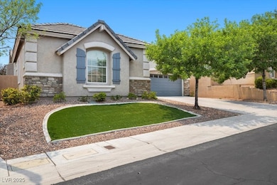 View of front of property featuring stone siding,