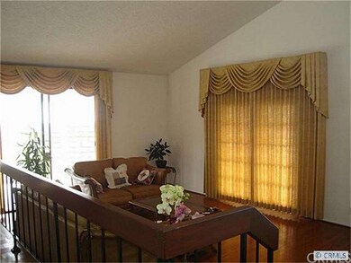 Formal living room with french door to courtyard
