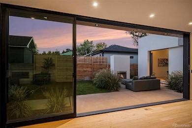 20' slider stacked glass from great room to patio