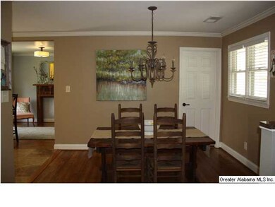 Dining room open to the living room & kitchen