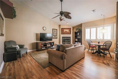VAULTED CEILING WITH COZY FIREPLACE