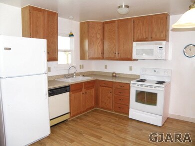 New cabinets, counters and laminate flooring.