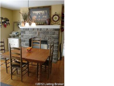 Kitchen eating area with fireplace